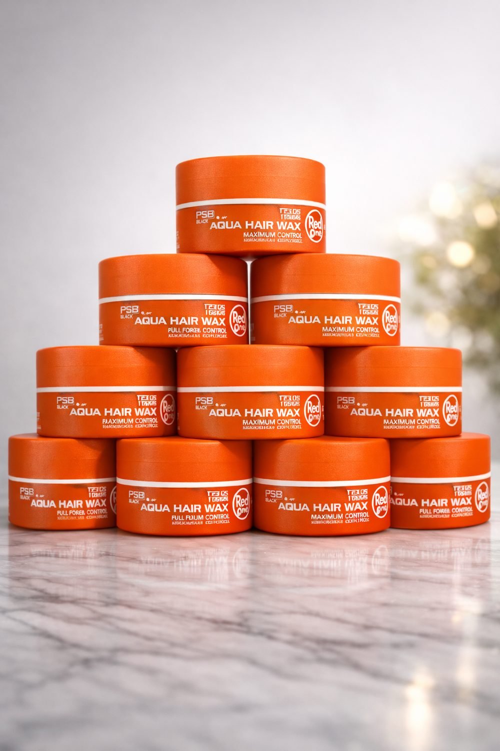 Red One Orange Wax bei Kamm & Schere Norderstedt